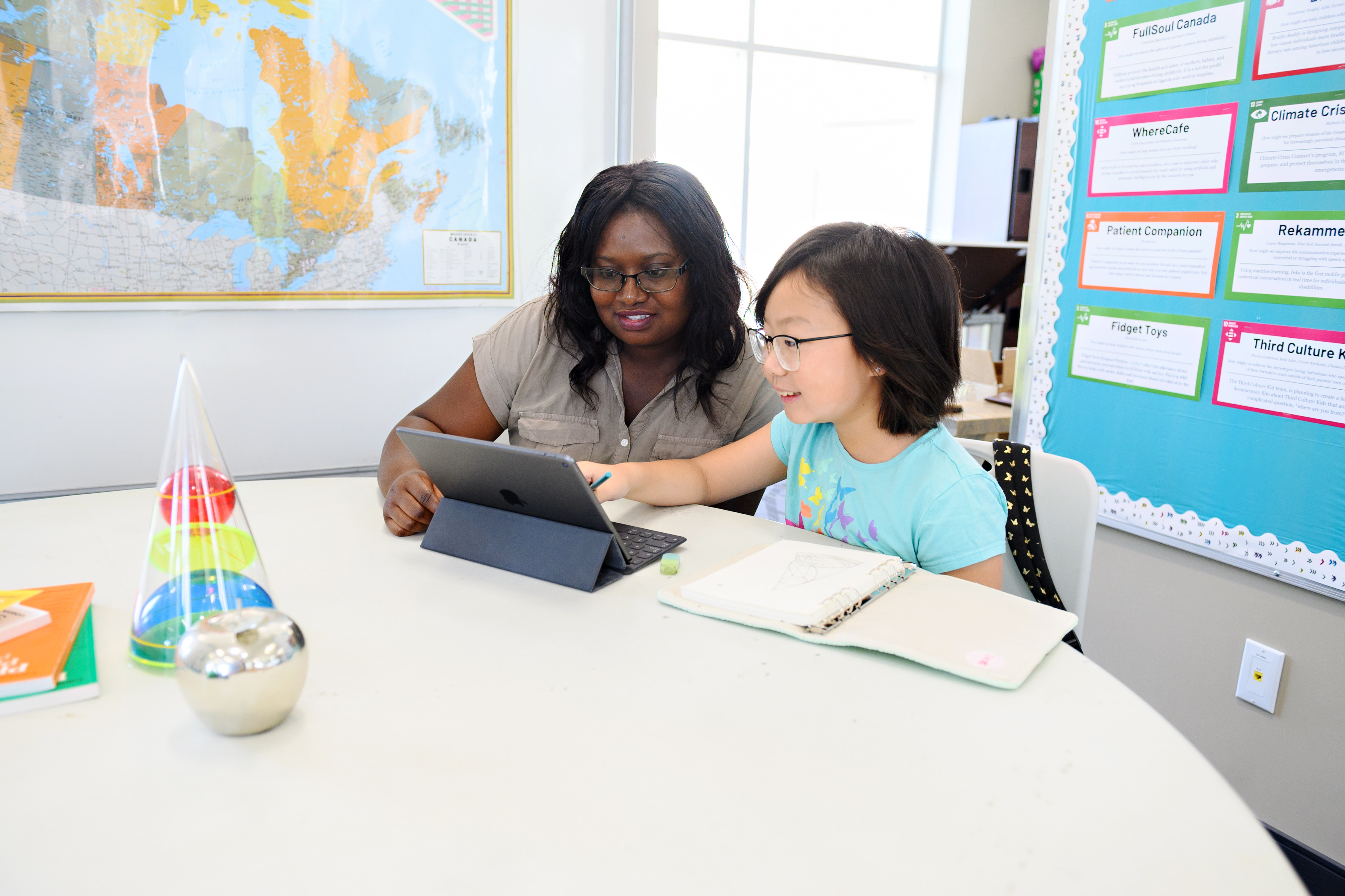 Student and educator working online together on problems