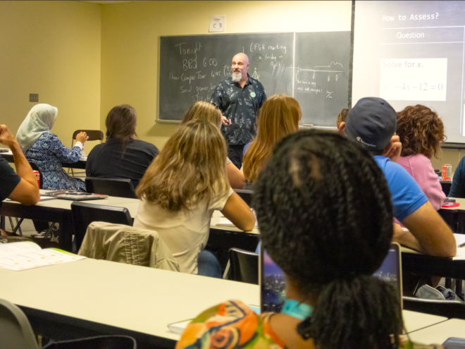 Educators attending a lecture at the Summer Conference for Mathematics Educators