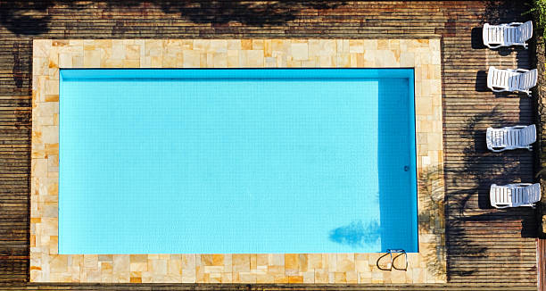 The rectangular pool and its border. The outer edge of the border is also rectangular.