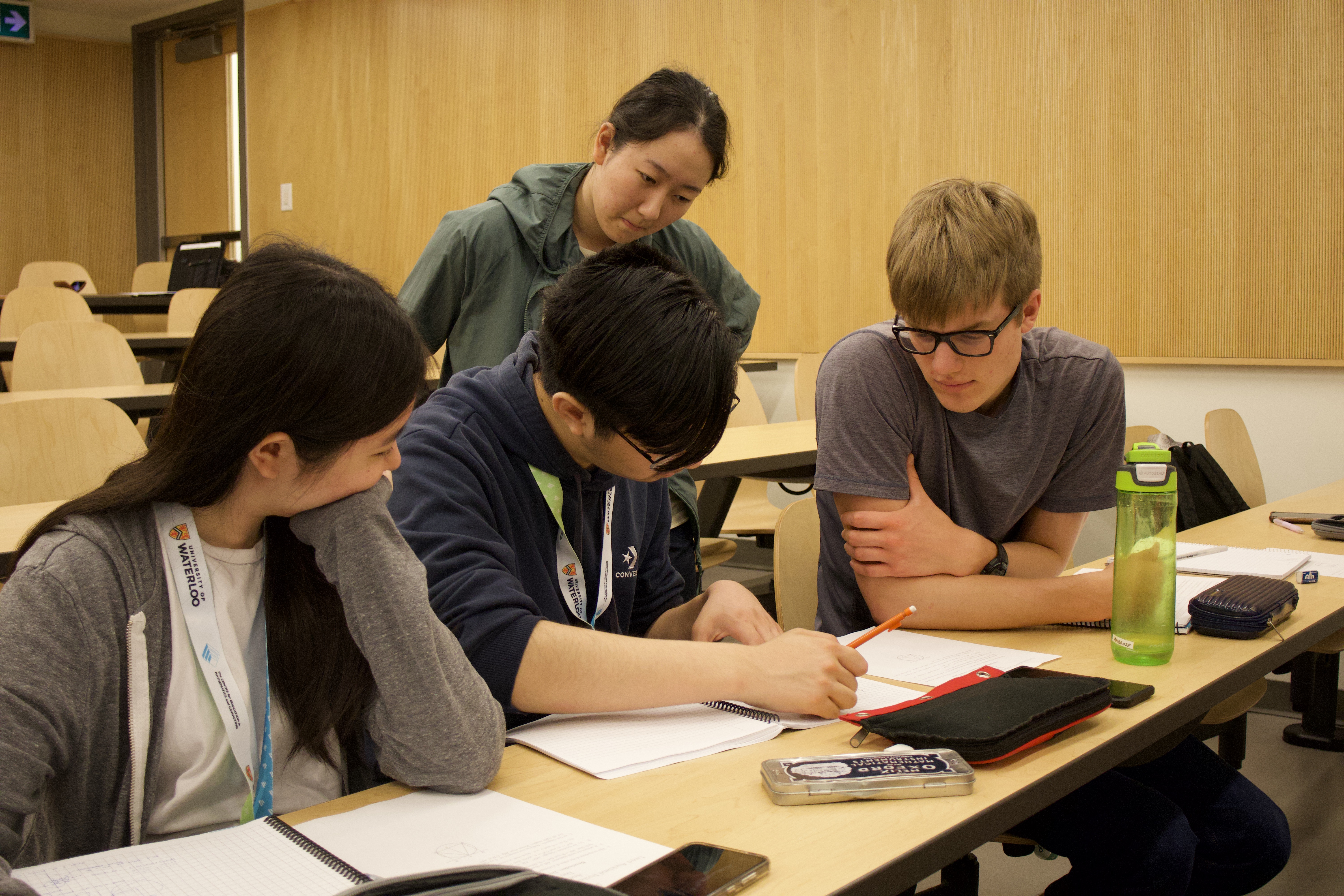Students working together on a team contest