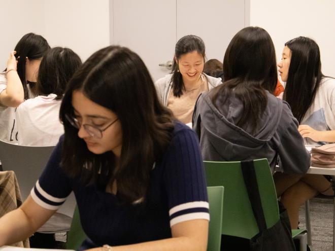Group of students interacting at a CEMC workshop