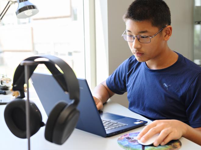 Student using the laptop for online learning