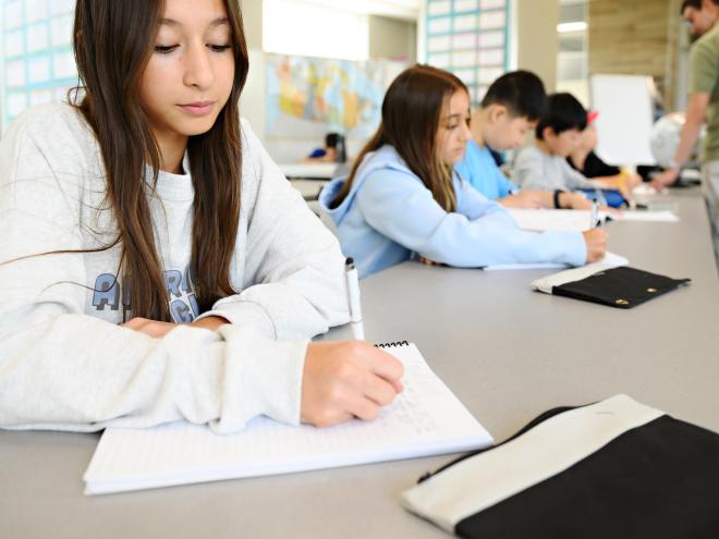 Students working on math contests in the classroom