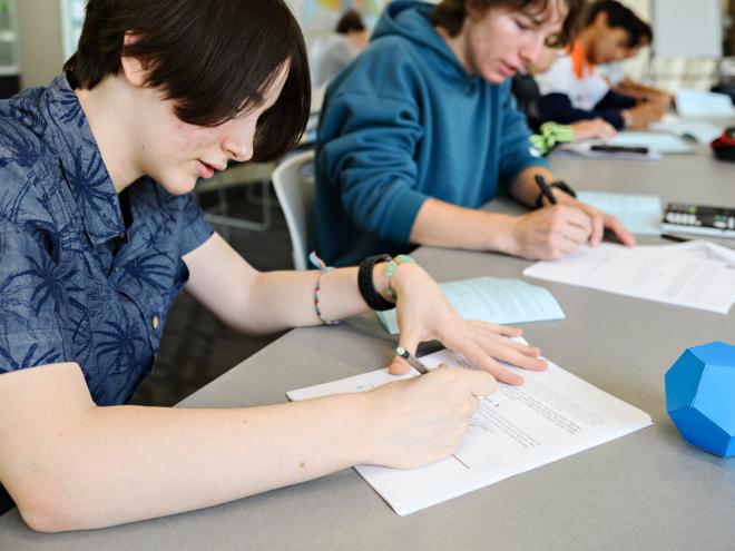Students working on a CEMC mathematics contest in the classroom