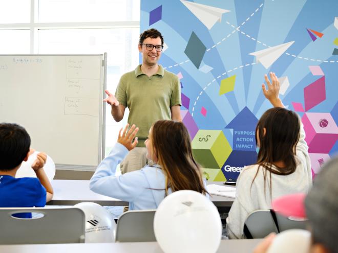 Educator interacting with students